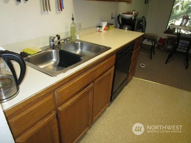 kitchen featuring dishwasher and sink