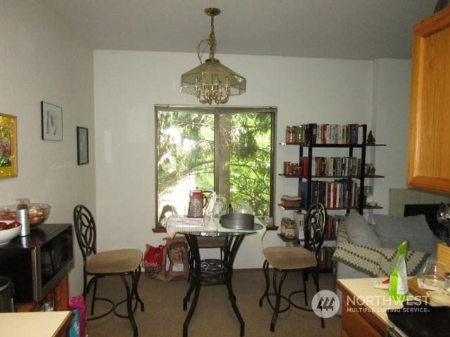 dining room with a chandelier