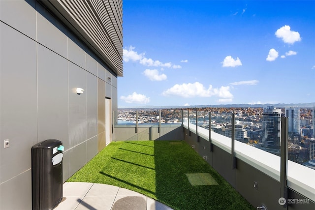 view of yard featuring a balcony