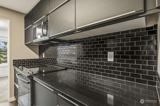 kitchen featuring backsplash and appliances with stainless steel finishes