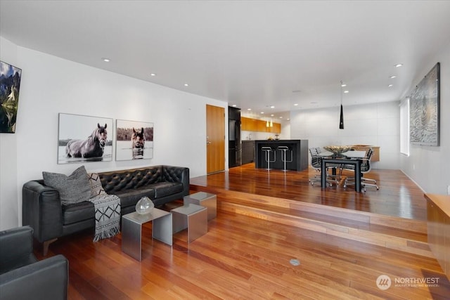 living room with hardwood / wood-style flooring