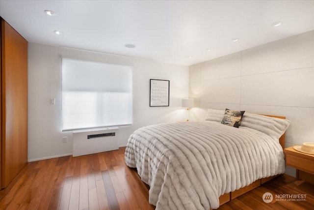 bedroom featuring hardwood / wood-style flooring