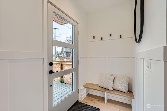 mudroom featuring hardwood / wood-style flooring and a wealth of natural light