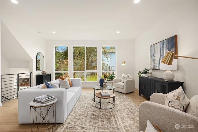 living room with light hardwood / wood-style flooring