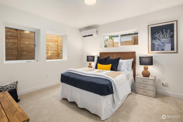 bedroom with light carpet and a wall unit AC