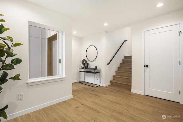 entrance foyer with light wood-type flooring