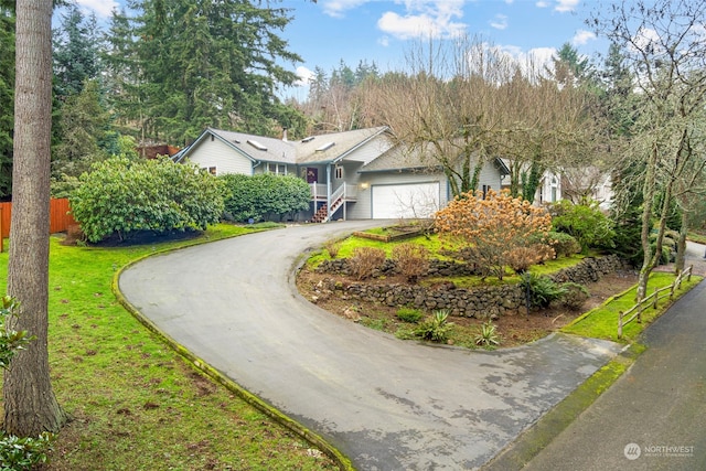 ranch-style home with a garage