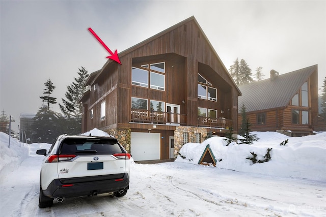 view of front of property with a garage