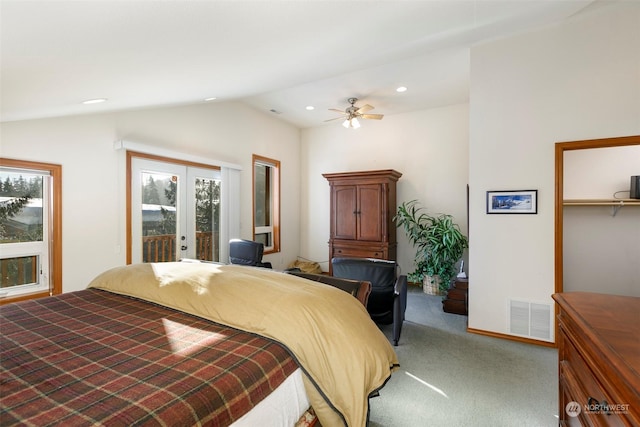 bedroom with french doors, a spacious closet, vaulted ceiling, access to outside, and ceiling fan