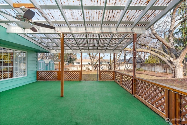 view of patio with ceiling fan and a pergola