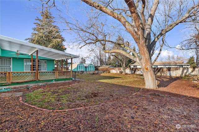 view of yard featuring ceiling fan