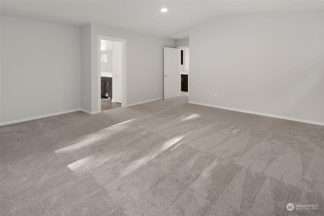 unfurnished room featuring carpet flooring