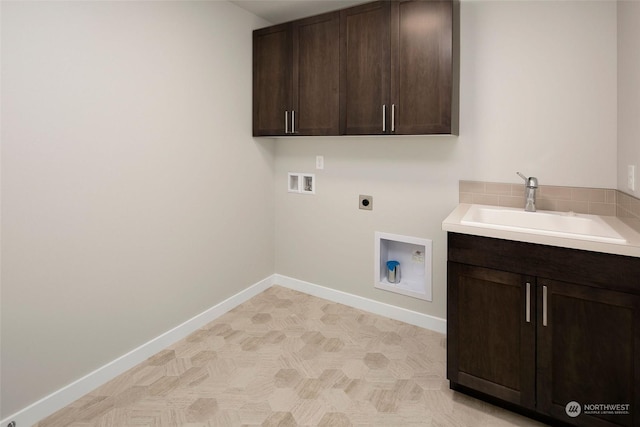 washroom with cabinets, hookup for a washing machine, electric dryer hookup, and sink