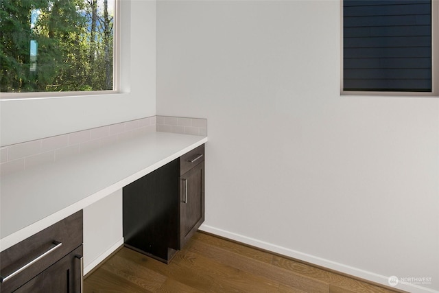 interior space with dark hardwood / wood-style floors