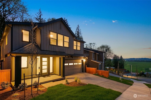 view of front of property with a garage