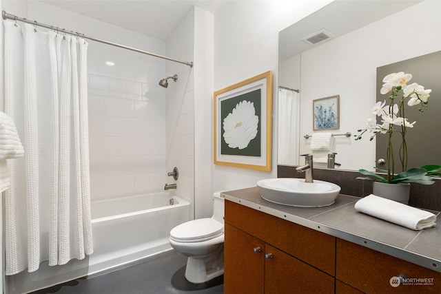 full bathroom featuring toilet, vanity, and shower / bath combo