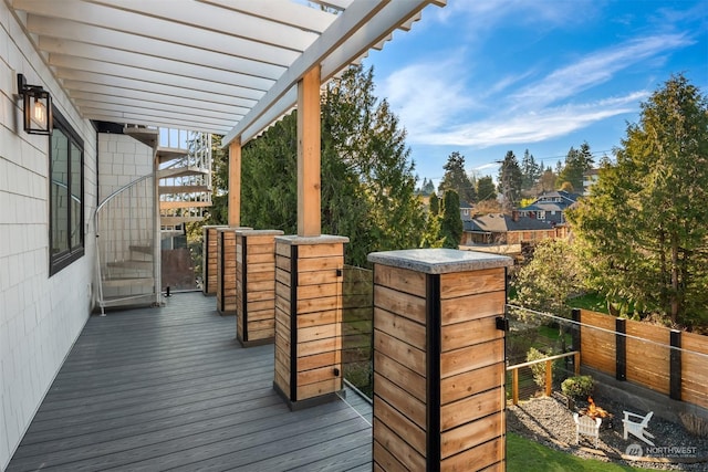 wooden deck featuring a pergola