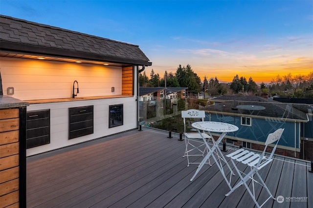 view of deck at dusk