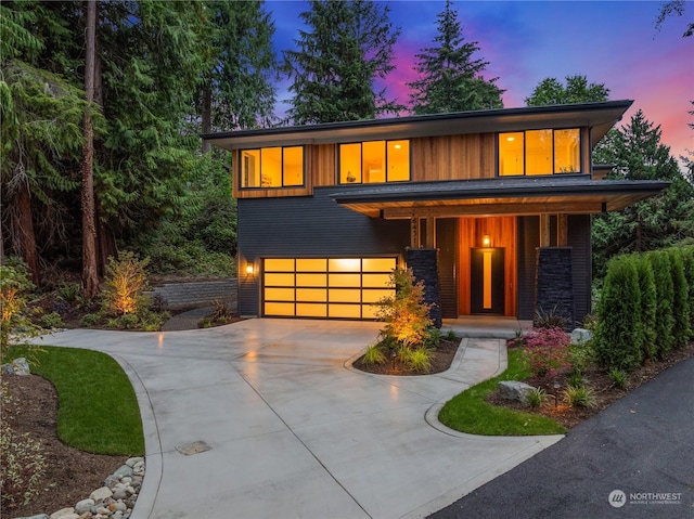 view of front of property with a garage