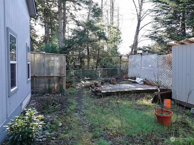 view of yard featuring a deck