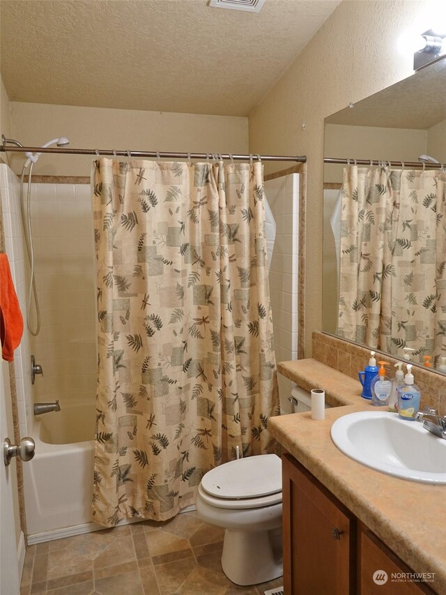 full bathroom with a textured ceiling, toilet, vanity, and shower / tub combo with curtain