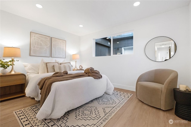 bedroom featuring light hardwood / wood-style flooring