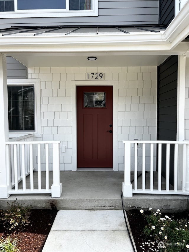 entrance to property with covered porch