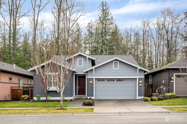 view of front facade featuring a front lawn and a garage