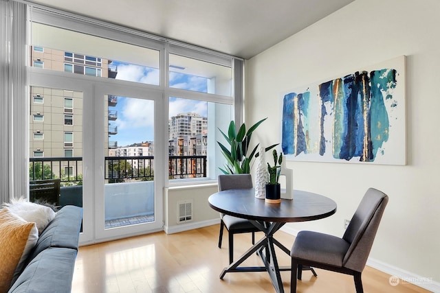 dining room featuring light hardwood / wood-style floors