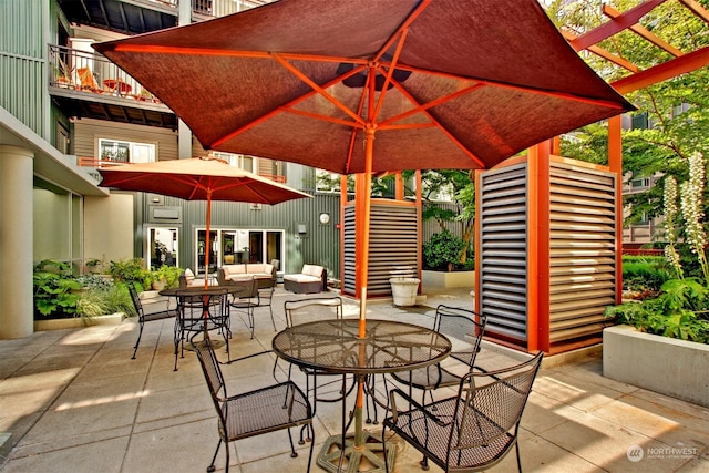 view of patio / terrace featuring a pergola and an outdoor living space