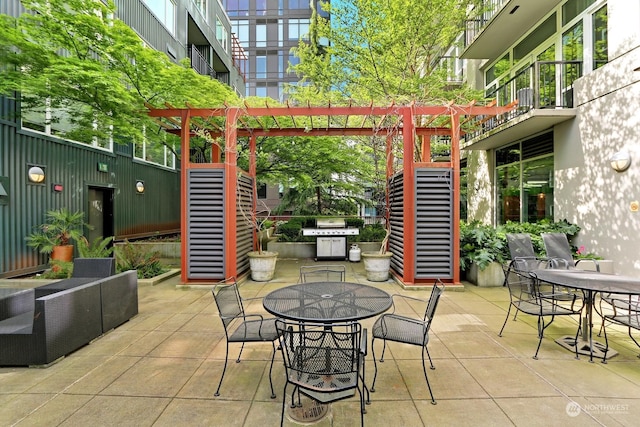 view of patio / terrace featuring a pergola and grilling area