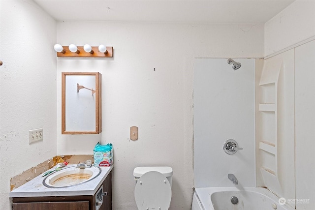 full bathroom featuring vanity, toilet, and bathing tub / shower combination