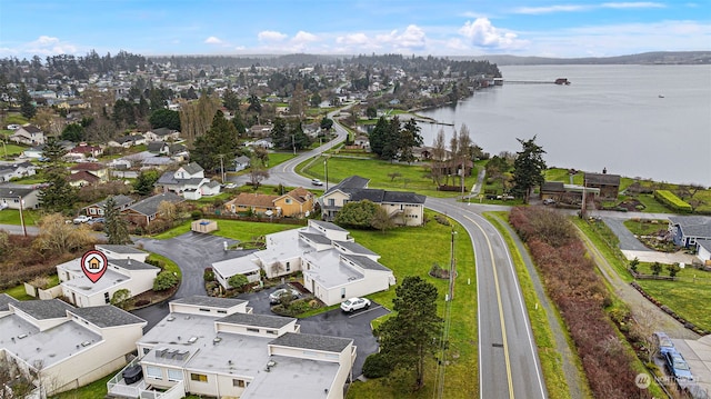 drone / aerial view featuring a water view