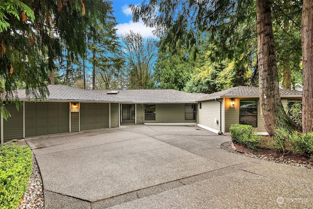 ranch-style home with a garage