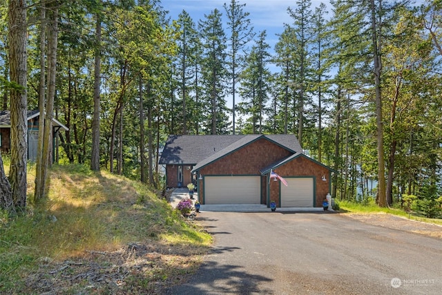 view of front of property featuring a garage