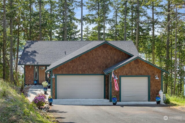 single story home featuring a garage