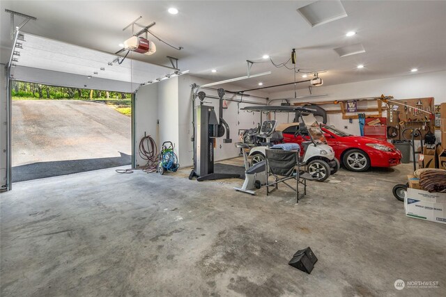 garage featuring a garage door opener