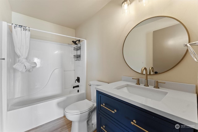 full bathroom with vanity, shower / bathtub combination with curtain, wood-type flooring, and toilet