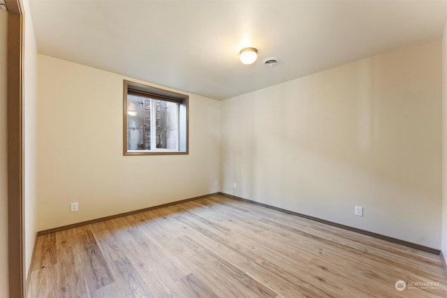 empty room featuring light wood-type flooring