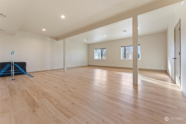 basement featuring light hardwood / wood-style floors