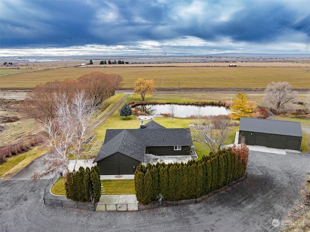 bird's eye view with a rural view and a water view