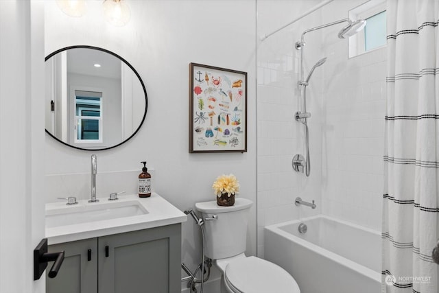 full bathroom featuring vanity, toilet, and shower / bath combo with shower curtain