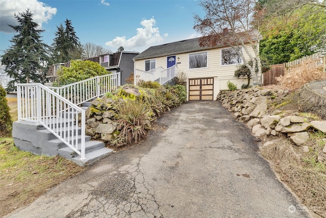 view of front of property featuring a garage