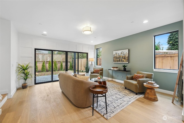 living room with light hardwood / wood-style floors