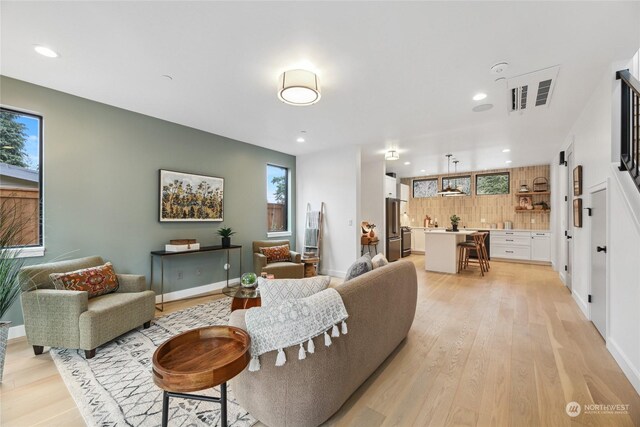 living room with light wood-type flooring