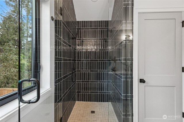 bathroom with an enclosed shower