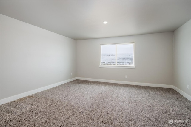 empty room featuring carpet floors