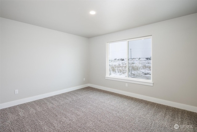 empty room featuring carpet floors