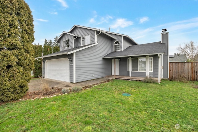 view of front facade featuring a front lawn and a garage