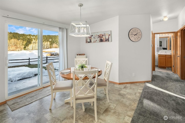 dining room featuring sink